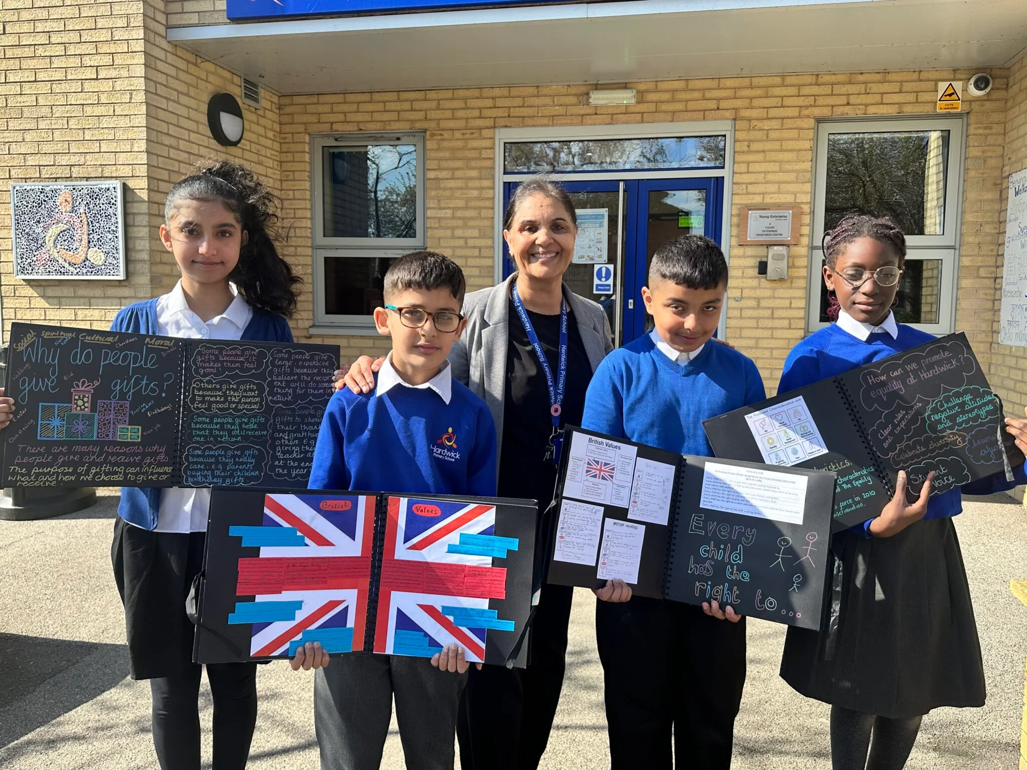Students from Hardwick primary school displaying their work.